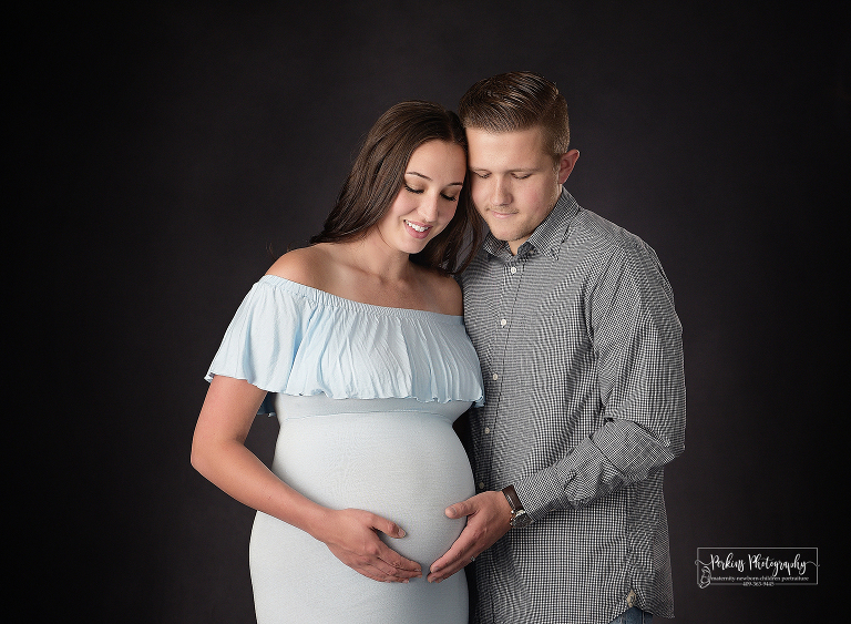 beautiful mom and dad with expecting baby boy